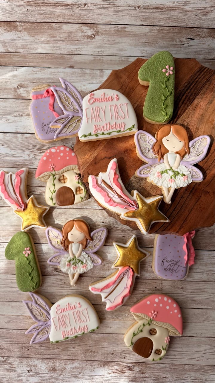 Pink and lavender fairy first birthday cookies