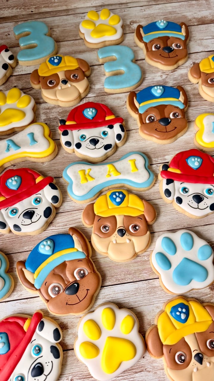 Colorful Paw Patrol inspired cookies for a third birthday